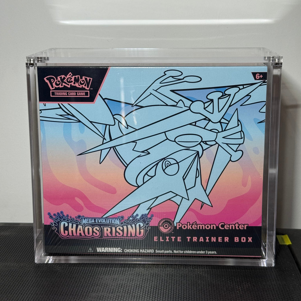 Pokémon Center Chaos Rising Elite Trainer Box in a clear acrylic protective case, featuring a blue line-art illustration of a Pokémon on a pink and blue gradient background.