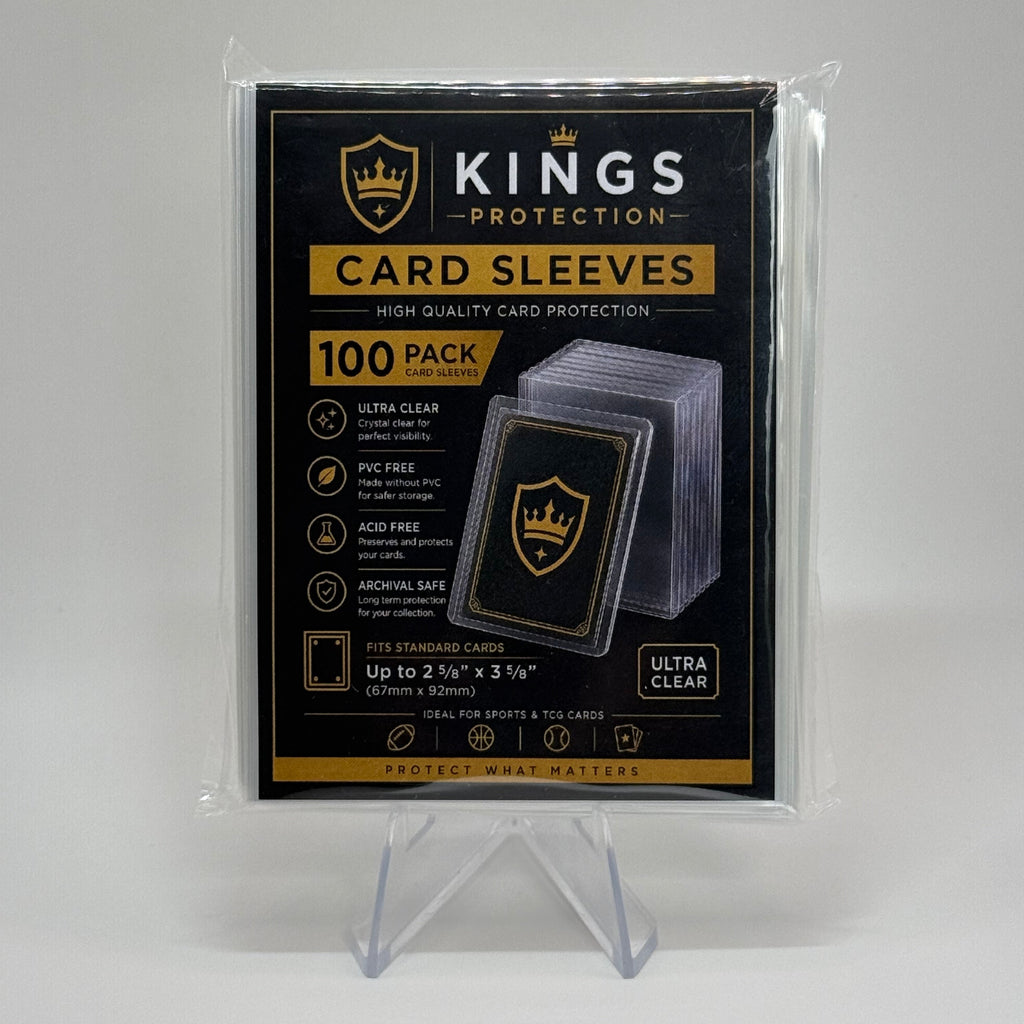 Kings Protection 100-pack of ultra clear card sleeves in retail packaging, displayed on a clear acrylic stand against a neutral gray background.